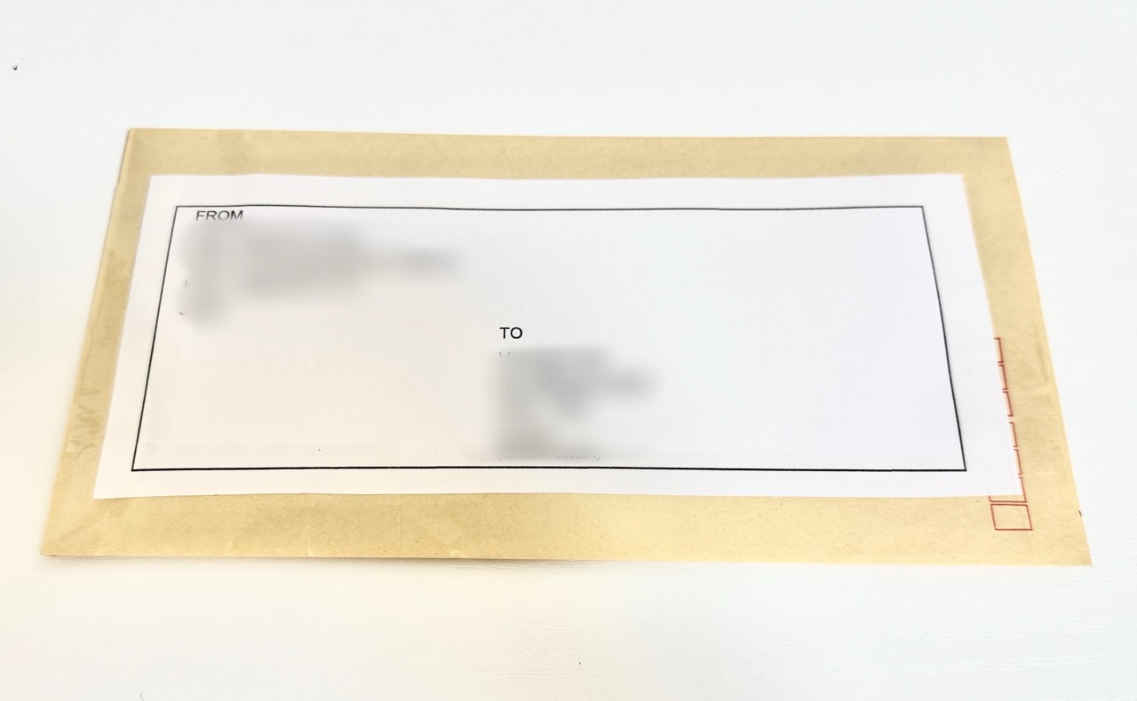 Shipping label is applied and the parcel is ready to go.